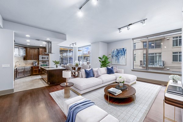 Modern living room with sleek furnishings at Ashton at Judiciary Square Apartments