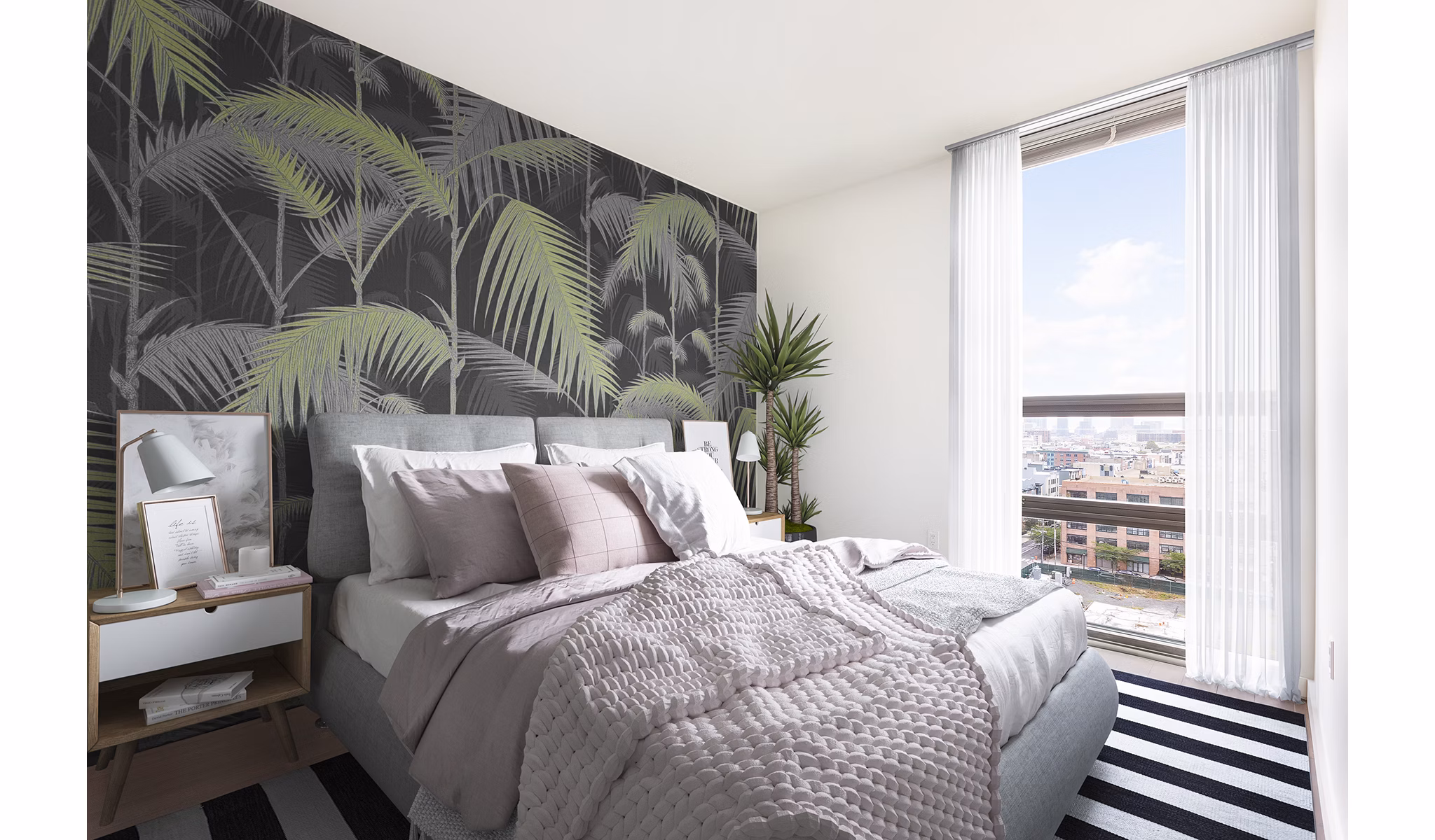 Cozy bedroom with modern design elements in VINE Apartments