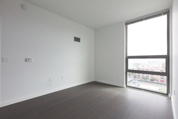 Modern bedroom with elegant decor at VINE Apartments