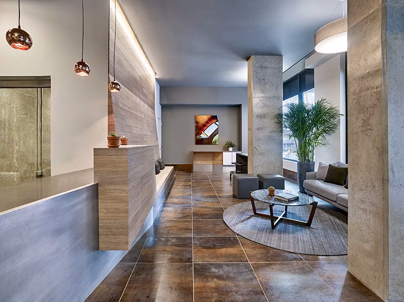 Elegant clubhouse featuring modern furnishings at VINE Apartments