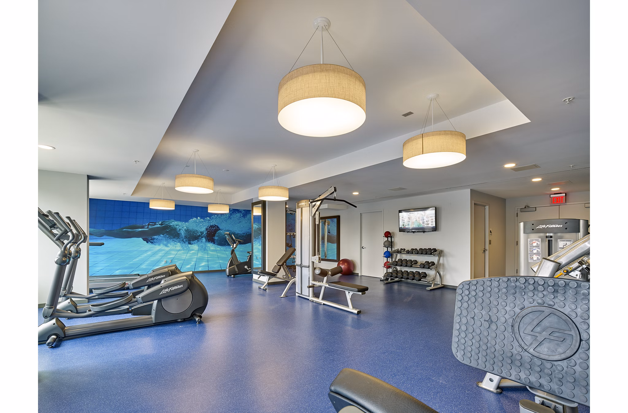 State-of-the-art fitness center with modern equipment at VINE Apartments