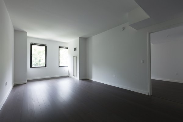 Spacious living room with modern decor at VINE Apartments in Greystar's luxury portfolio