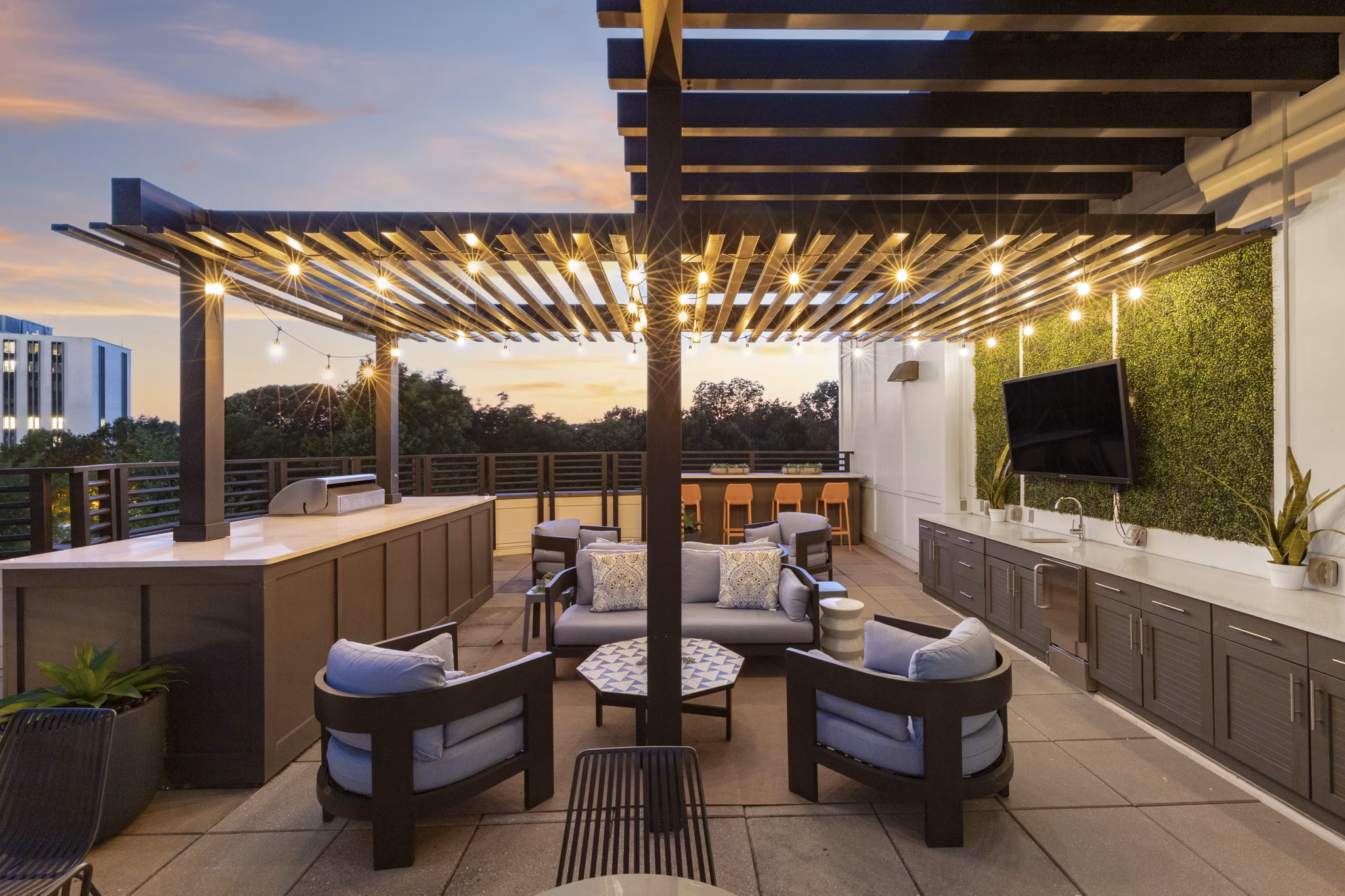 Elegant clubhouse with modern decor at 1133 on the Square Apartments, ideal for gatherings and relaxation in a luxury setting