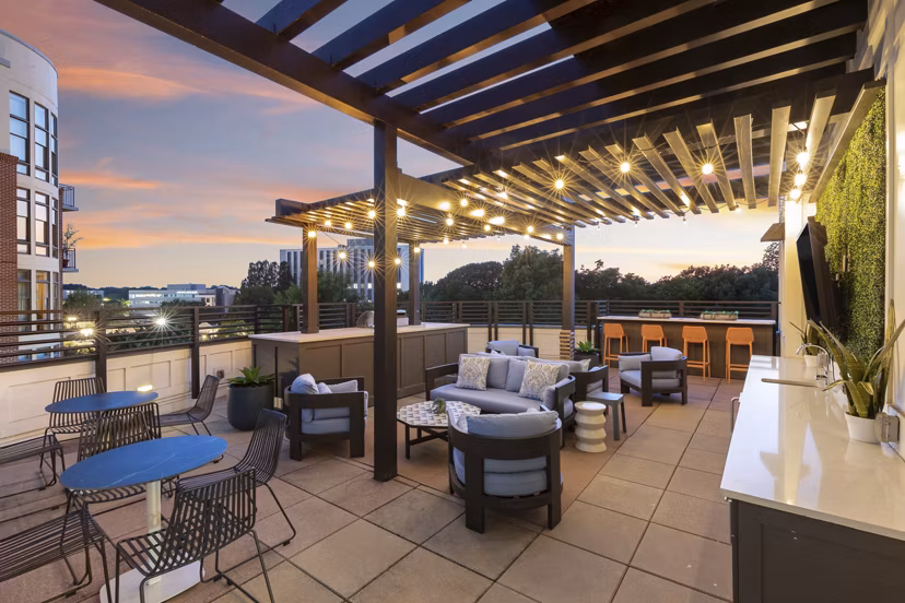 Clubhouse with modern seating and stylish decor at 1133 on the Square Apartments, ideal for social gatherings and community events