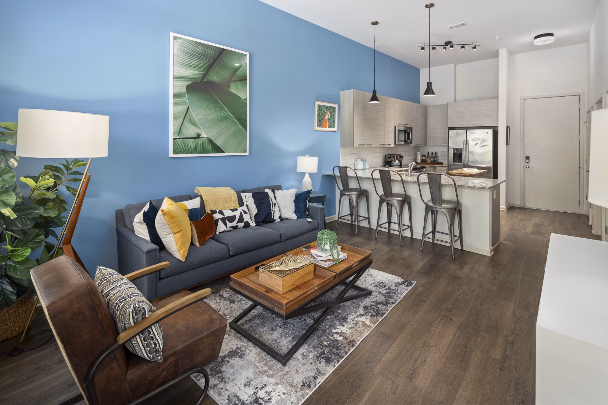 Clubhouse with modern seating and entertainment area at 1133 on the Square Apartments