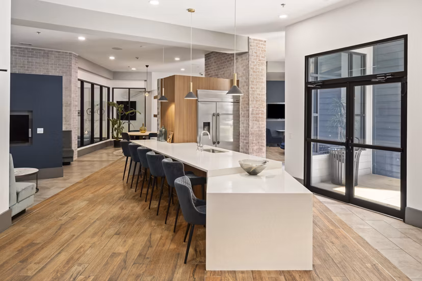 Elegant clubhouse featuring stylish lounge seating at 1133 on the Square Apartments, perfect for social gatherings and community events