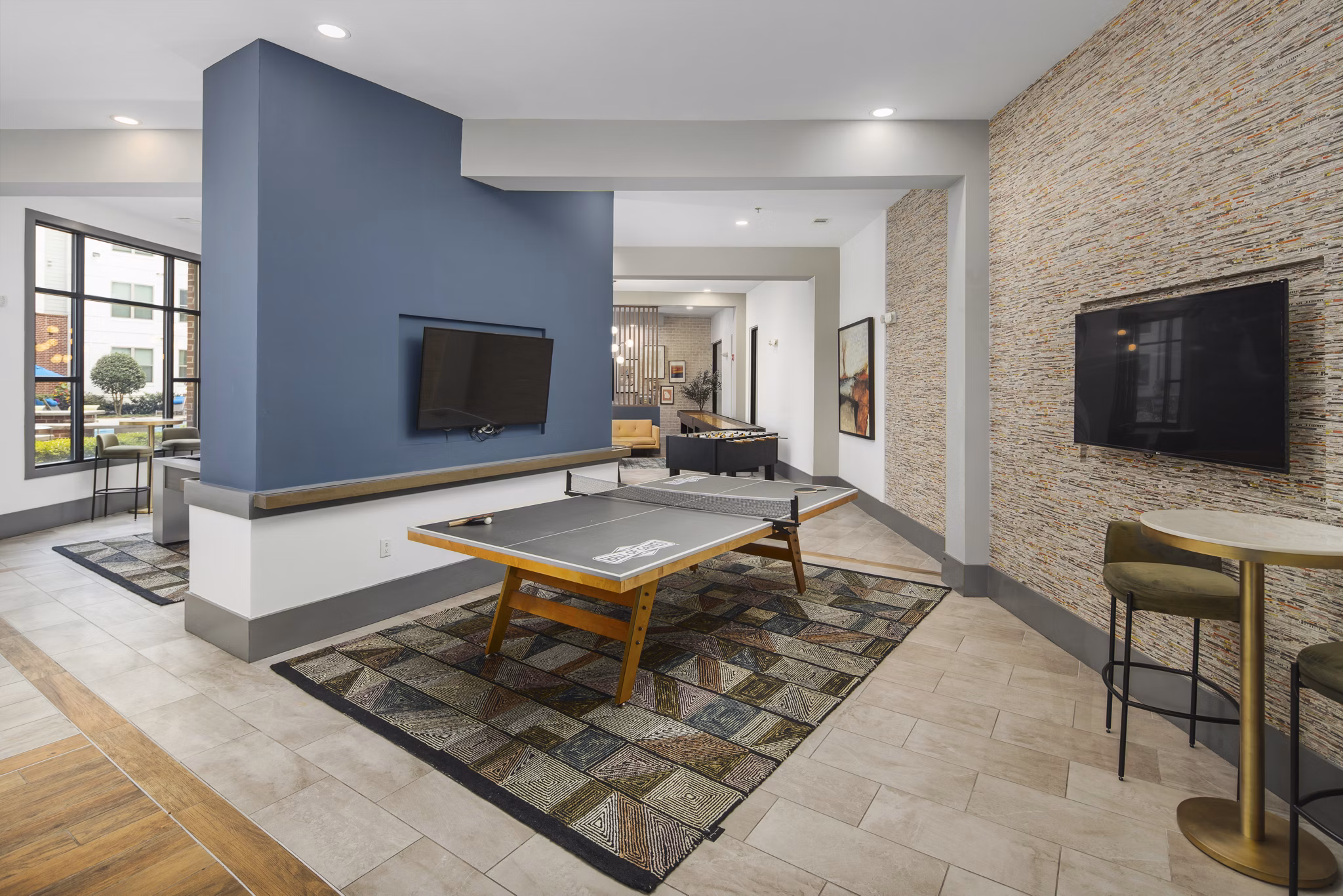 Elegant clubhouse with modern furnishings at 1133 on the Square Apartments, ideal for social gatherings and events