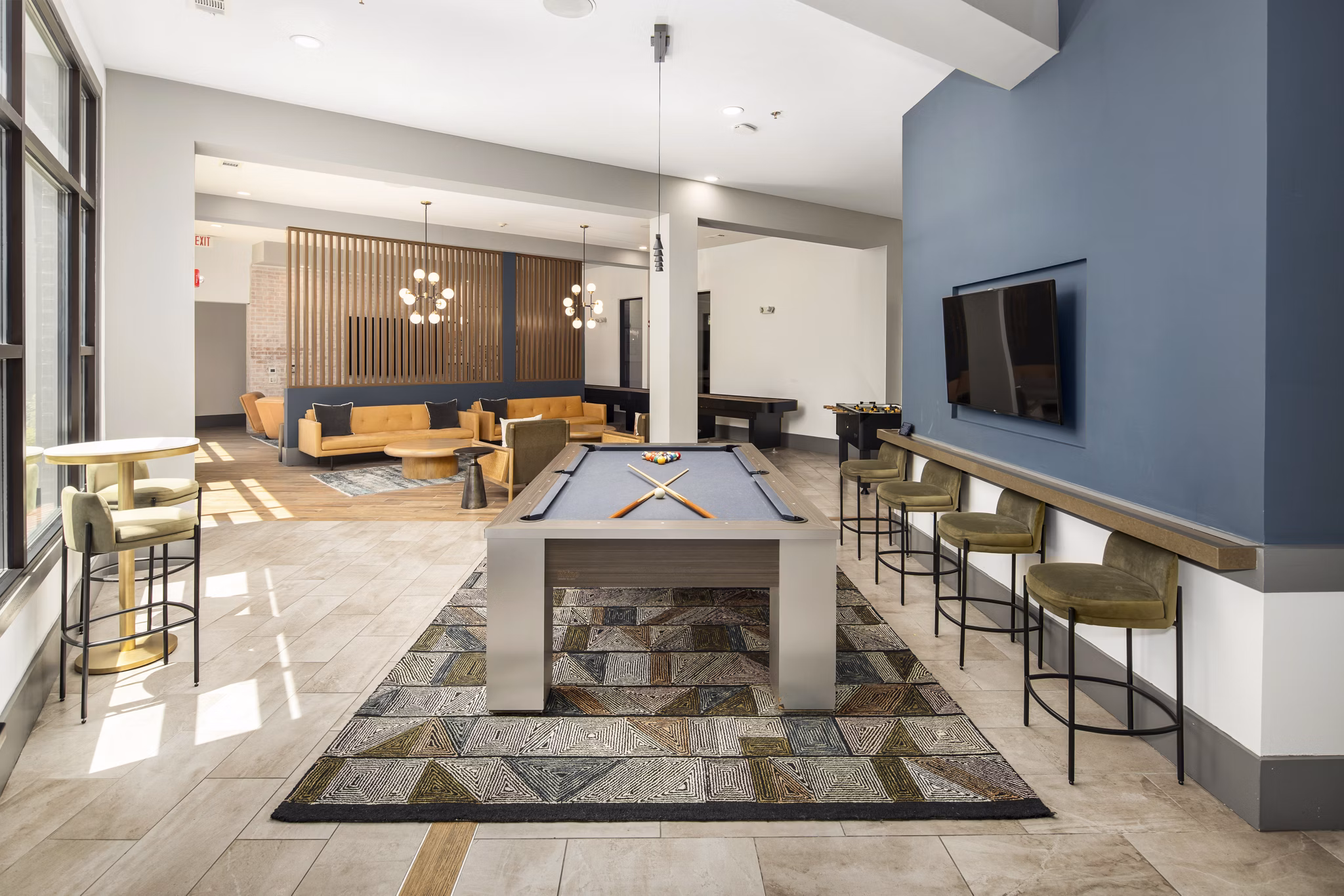 Elegant clubhouse with modern furnishings at 1133 on the Square Apartments
