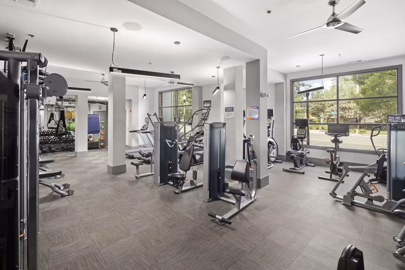 State-of-the-art fitness center at 1133 on the Square Apartments offering modern equipment and workout spaces