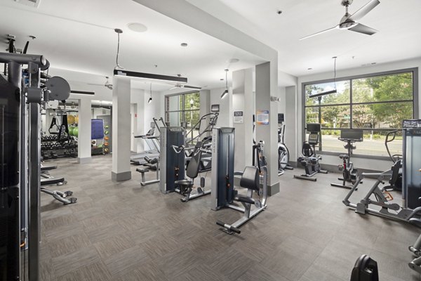 State-of-the-art fitness center at 1133 on the Square Apartments offering modern equipment and workout spaces