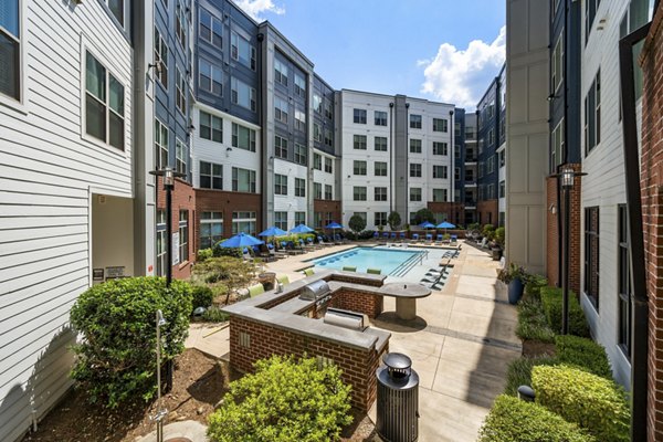 Rooftop pool with stunning city views at 1133 on the Square Apartments, a Greystar luxury property
