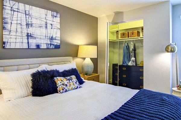 Cozy bedroom with modern decor at Heatherbrae Commons Apartments