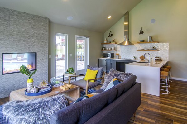 Clubhouse at Heatherbrae Commons Apartments featuring modern architecture and lush landscaping