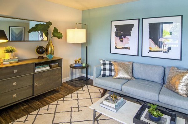 Spacious living room with elegant furnishings at Heatherbrae Commons Apartments