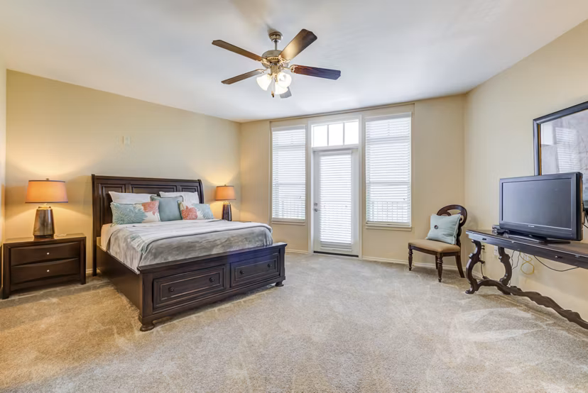 Cozy bedroom with modern decor at Overture Ridgmar Apartments luxury living space