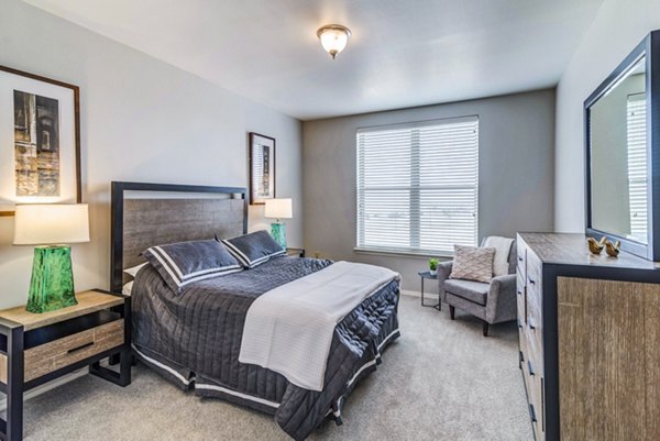 Spacious bedroom with modern decor in Overture Ridgmar Apartments