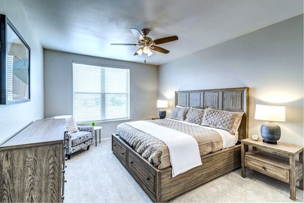 Elegant bedroom with stylish decor at Overture Ridgmar Apartments, featuring luxury finishes and ample natural light