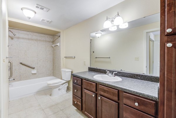 Luxurious bathroom featuring modern fixtures and marble countertops at Overture Ridgmar Apartments