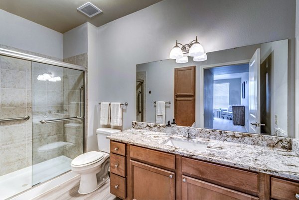 Modern bathroom featuring sleek fixtures and elegant design at Overture Ridgmar Apartments