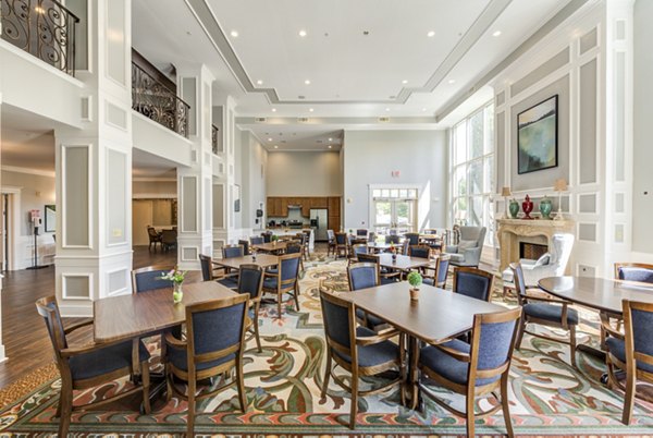 Clubhouse at Overture Ridgmar Apartments: Spacious community area with modern seating and entertainment options in Fort Worth, Texas