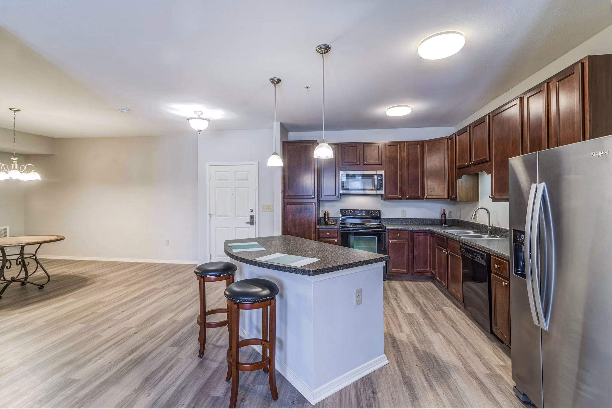 Overture Ridgmar: Modern kitchen with sleek cabinetry and stainless steel appliances at luxury apartments in Fort Worth