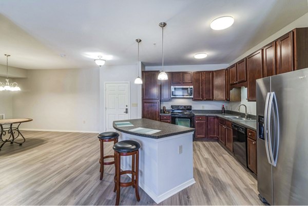 Overture Ridgmar: Modern kitchen with sleek cabinetry and stainless steel appliances at luxury apartments in Fort Worth