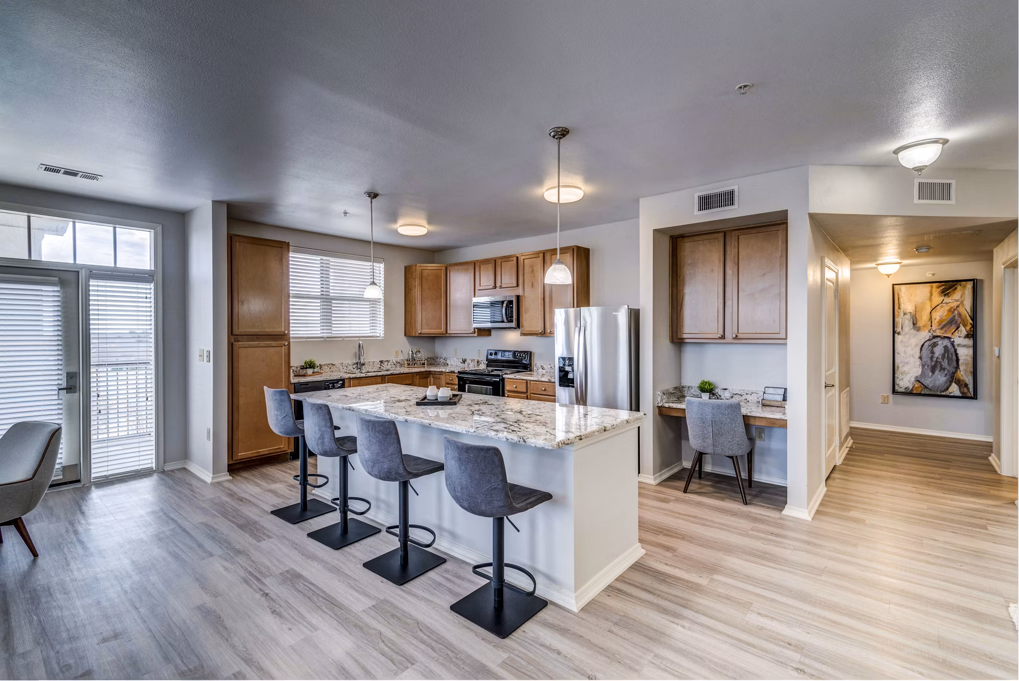 Modern kitchen with stainless steel appliances in Overture Ridgmar Apartments