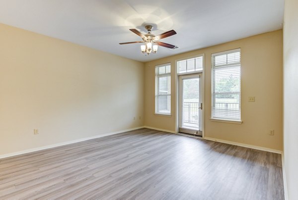 Elegant living room with plush seating and modern decor in Overture Ridgmar Apartments, a luxury community by Greystar