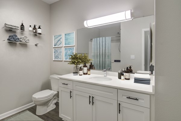 Bathroom with elegant fixtures and modern vanity at The Retreat at Marlborough luxury apartments