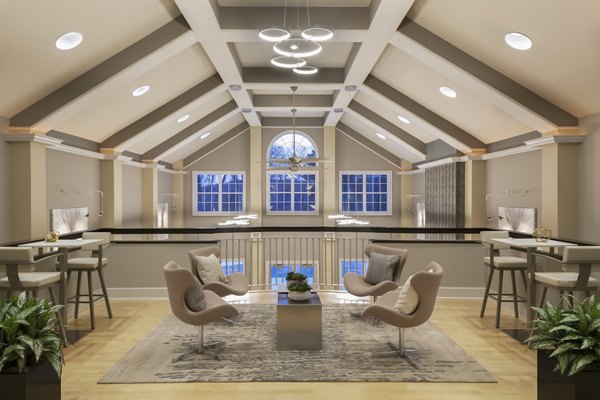 Clubhouse with modern decor and seating at Heights at Wheeler Hill Apartments