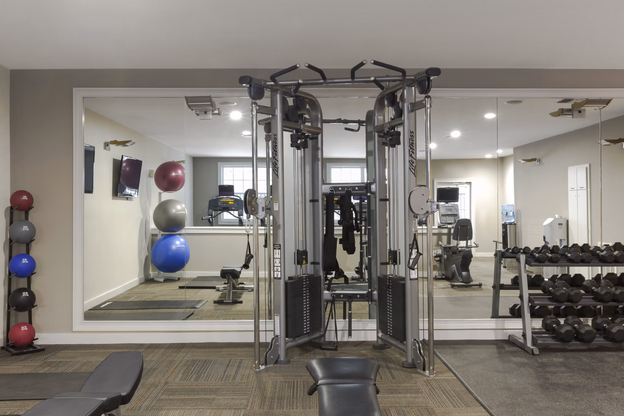 Modern fitness center with state-of-the-art equipment at Heights at Wheeler Hill Apartments
