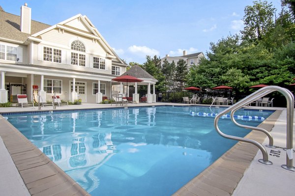 Rooftop pool with city views at Heights at Wheeler Hill Apartments