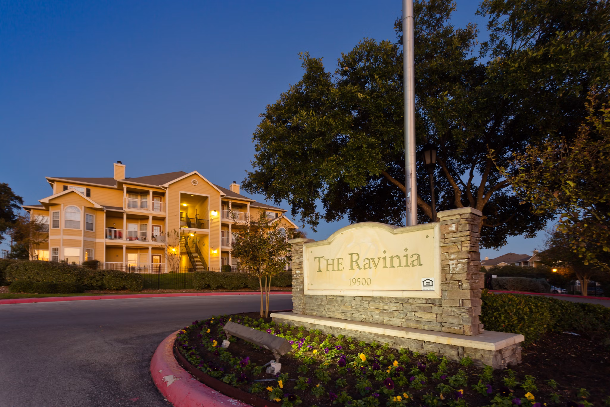The Ravinia Apartments: Elegant entrance signage at luxury living community