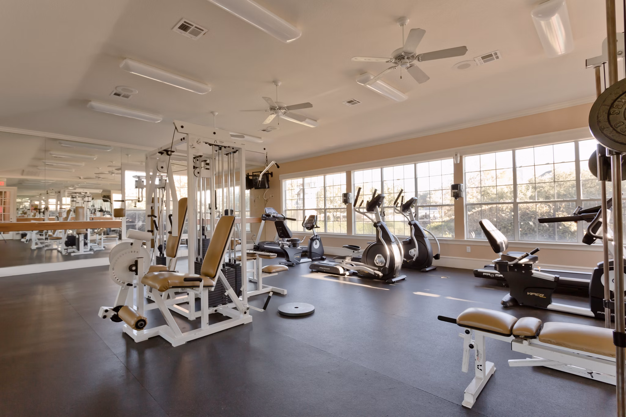 Modern fitness center with high-tech equipment at The Ravinia Apartments, a luxury living community in a prime location