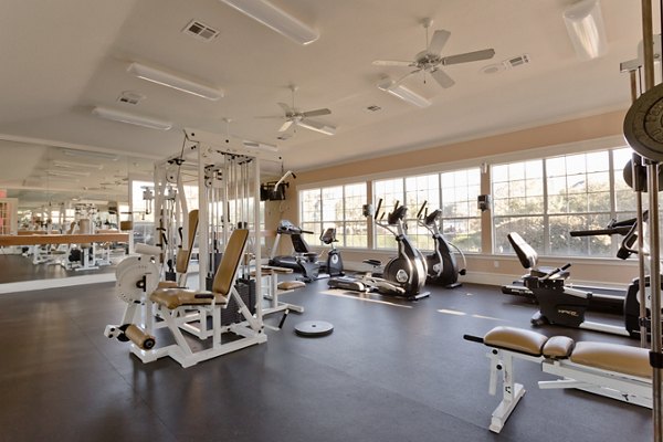 Modern fitness center with high-tech equipment at The Ravinia Apartments, a luxury living community in a prime location