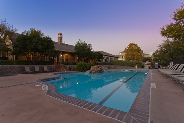 Rooftop pool with city views at The Ravinia Apartments