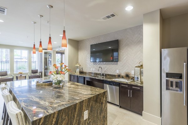 High Point Uptown Apartments: Elegant clubhouse with modern design and cozy seating areas