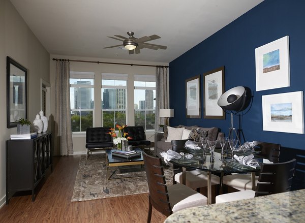 Dining room featuring contemporary design with elegant lighting at High Point Uptown Apartments