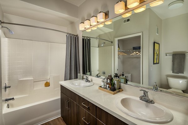 Modern bathroom with stylish fixtures at The Heights at Chino Hills Apartments