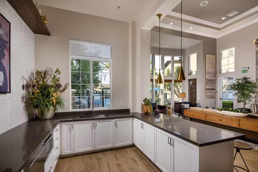 Clubhouse lobby with modern decor and seating at The Heights at Chino Hills Apartments