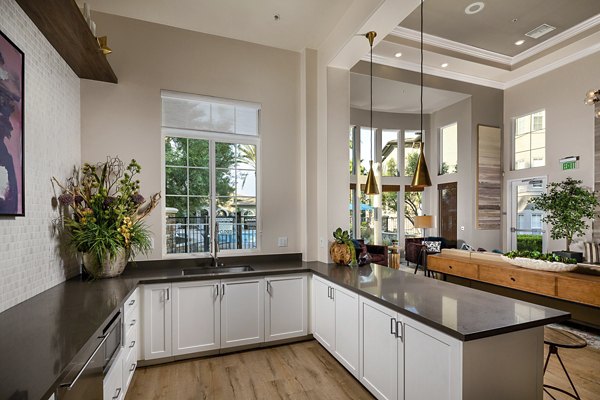 Clubhouse lobby with modern decor and seating at The Heights at Chino Hills Apartments