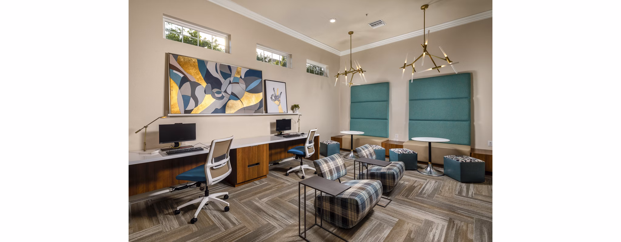 Modern business center with workstations at The Heights at Chino Hills Apartments, offering a professional environment for residents