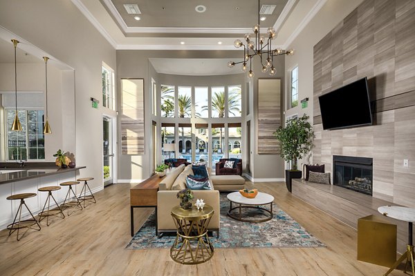 The Heights at Chino Hills: Elegant clubhouse lobby with modern furnishings for luxury living apartments