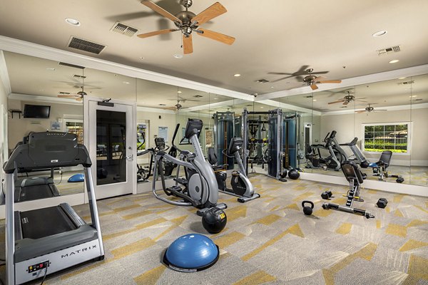 Fitness center featuring modern equipment at The Heights at Chino Hills Apartments