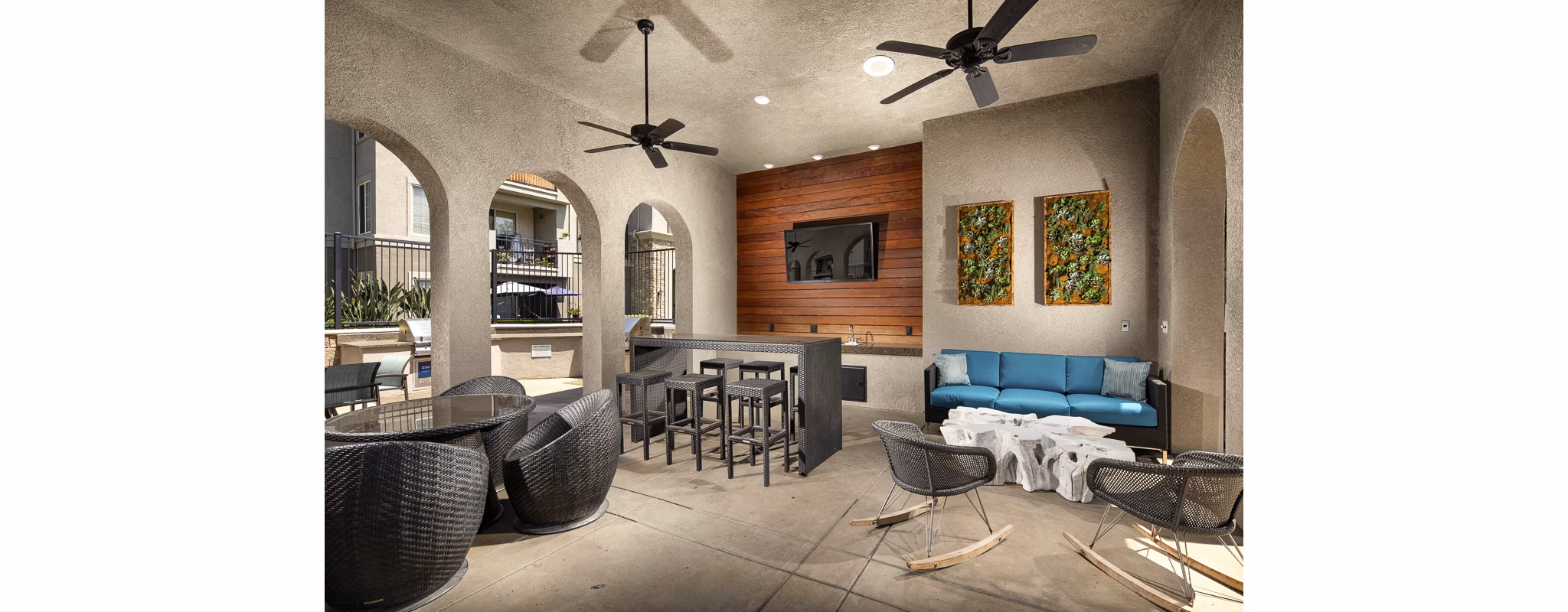 Expansive patio with outdoor seating at The Heights at Chino Hills Apartments, offering luxury living and scenic views