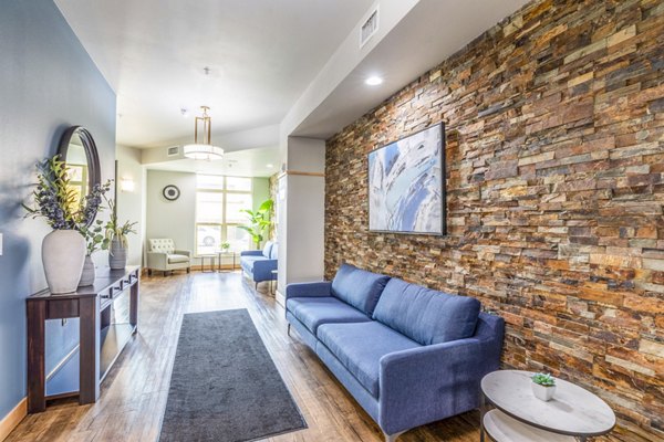 Elegant clubhouse lobby with modern furnishings at Overture Central Park Apartments