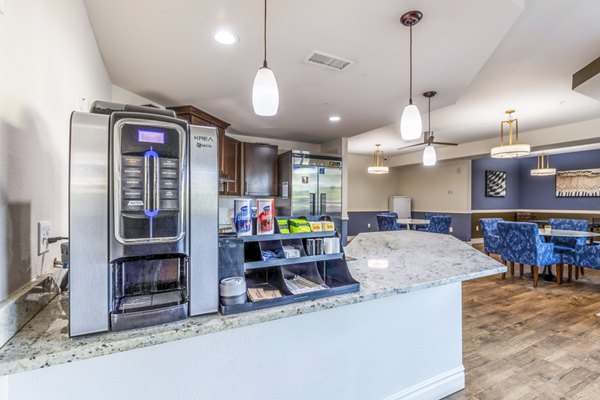 Clubhouse with modern design and stylish decor at Overture Central Park Apartments, a luxury living option from Greystar