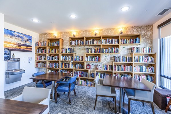 clubhouse library at Overture Central Park Apartments