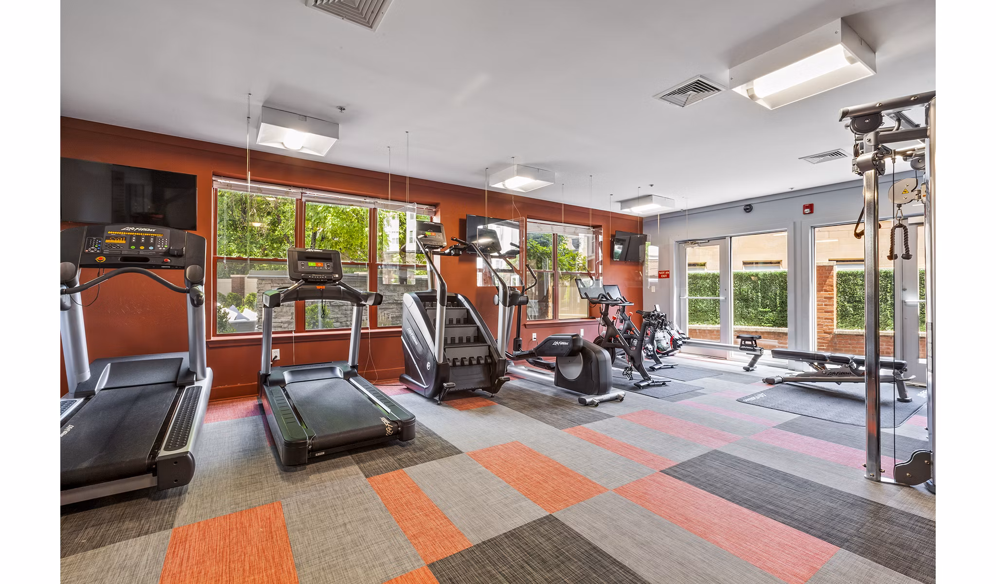 State-of-the-art fitness center with modern equipment at Rutherford Station Apartments
