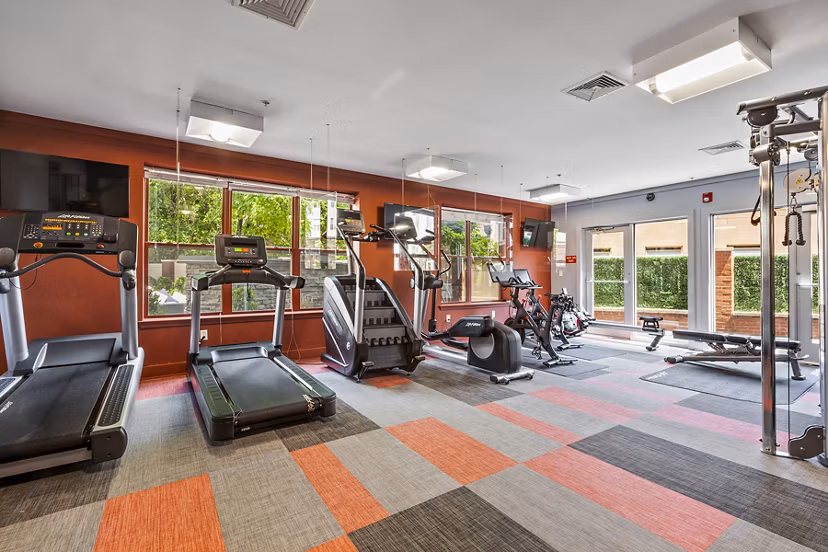 State-of-the-art fitness center with modern equipment at Rutherford Station Apartments